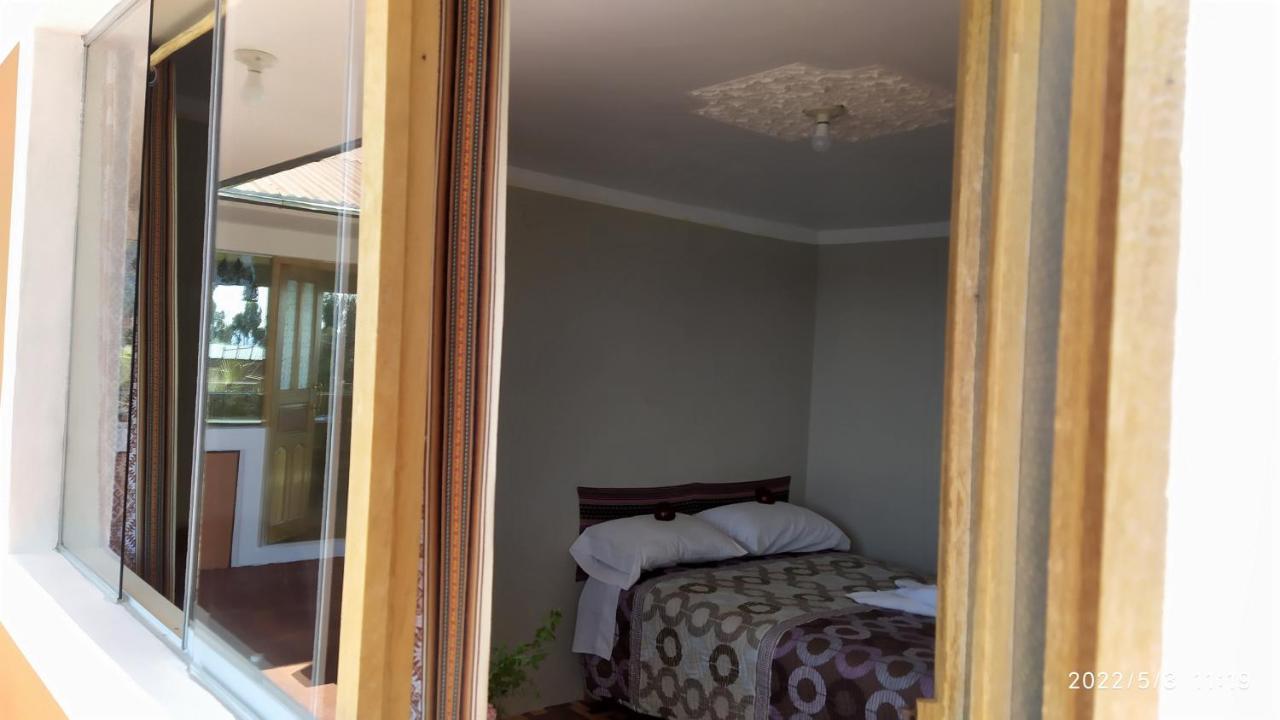 Tikawasi Homestay Comunidad Pueblo Isla Amantani Jose Luis Ocosuyo المظهر الخارجي الصورة
